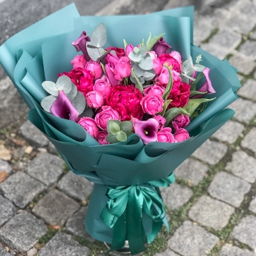 Bouquet with raspberry peonies