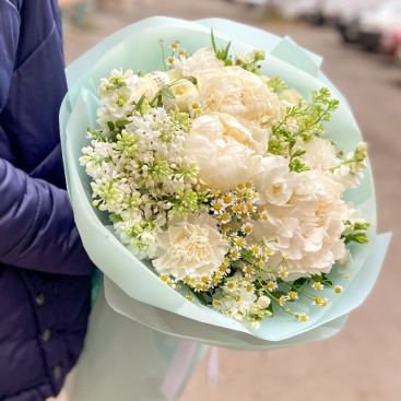 Bouquet with peonies and lilac